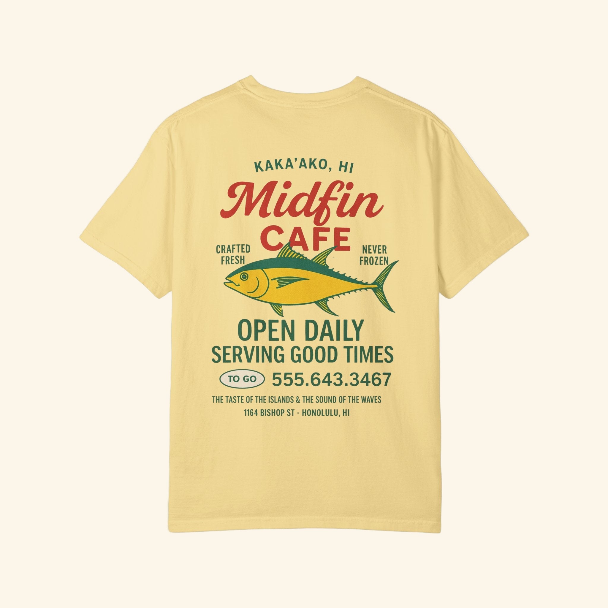 Yellow t-shirt with red text and fish graphic on a white background