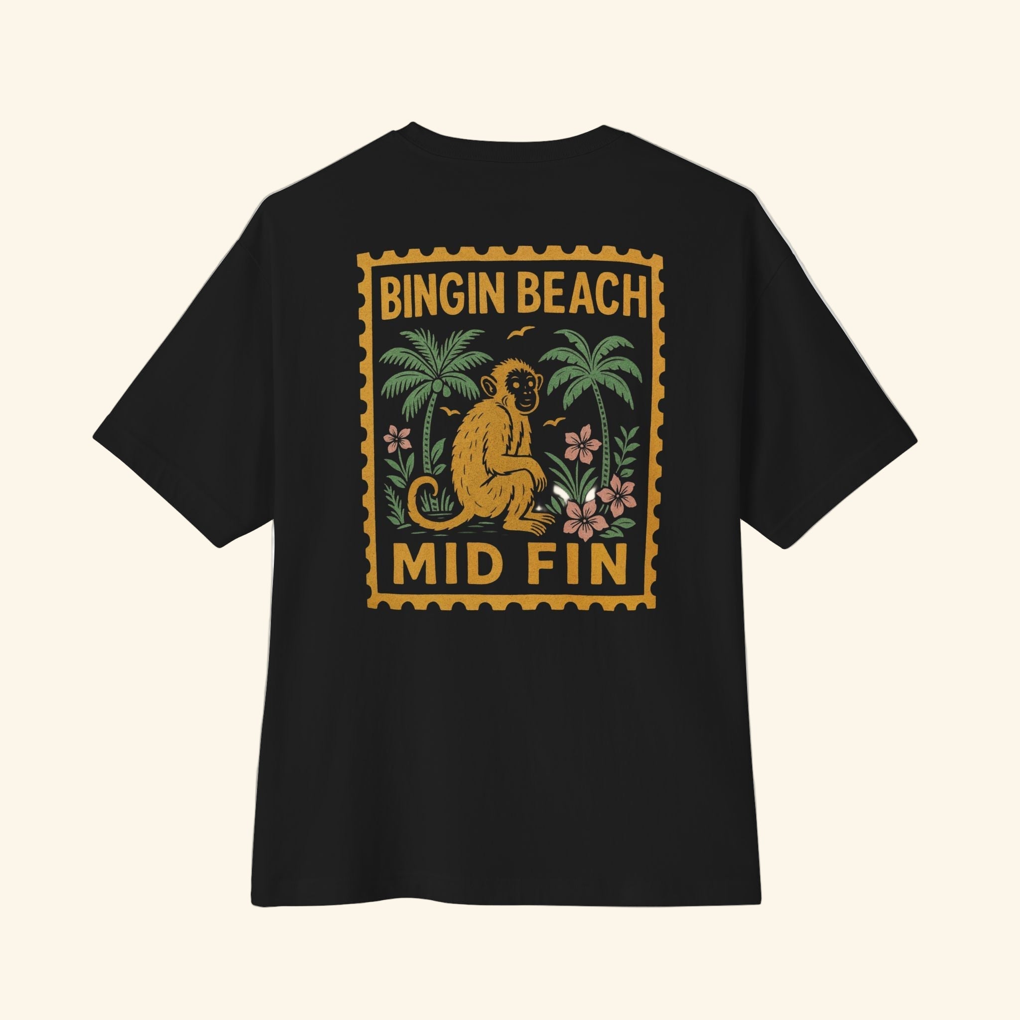Black t-shirt with 'Bingin Beach Mid Fin' graphic on a white background