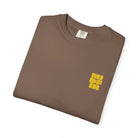 Jenga Tee in Espresso, folded, showing the chest logo and neck label
