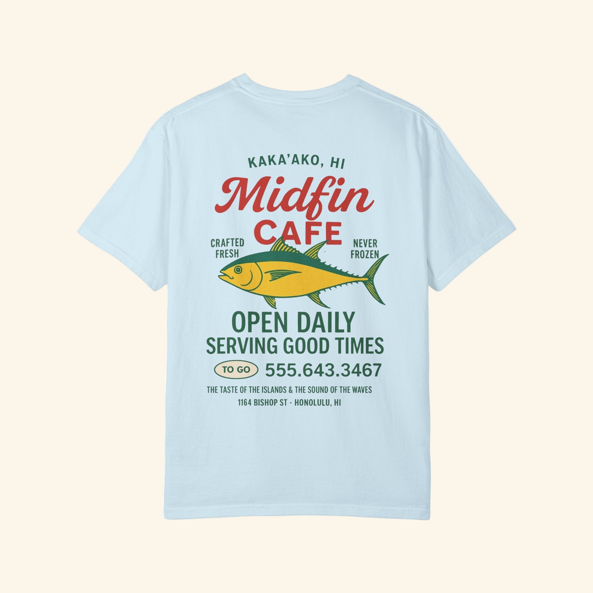Light blue t-shirt with red text and a fish graphic on the back, featuring 'Midfin Cafe' branding.