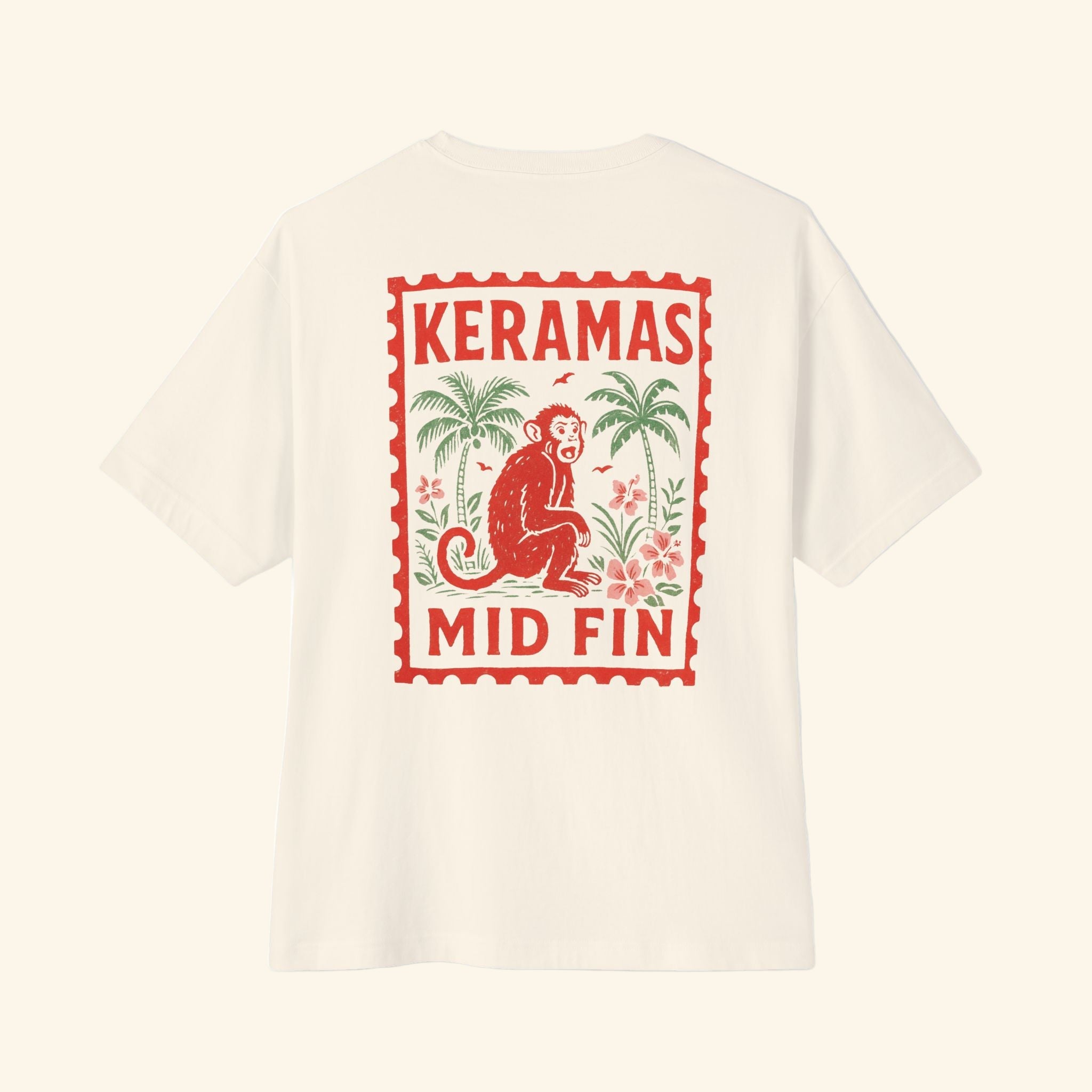 Beige t-shirt with red and green graphic design on a white background