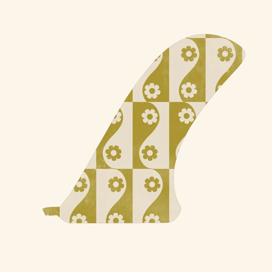 Decorative fin with green and white floral pattern on a white background