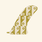 Decorative fin with green and white floral pattern on a white background